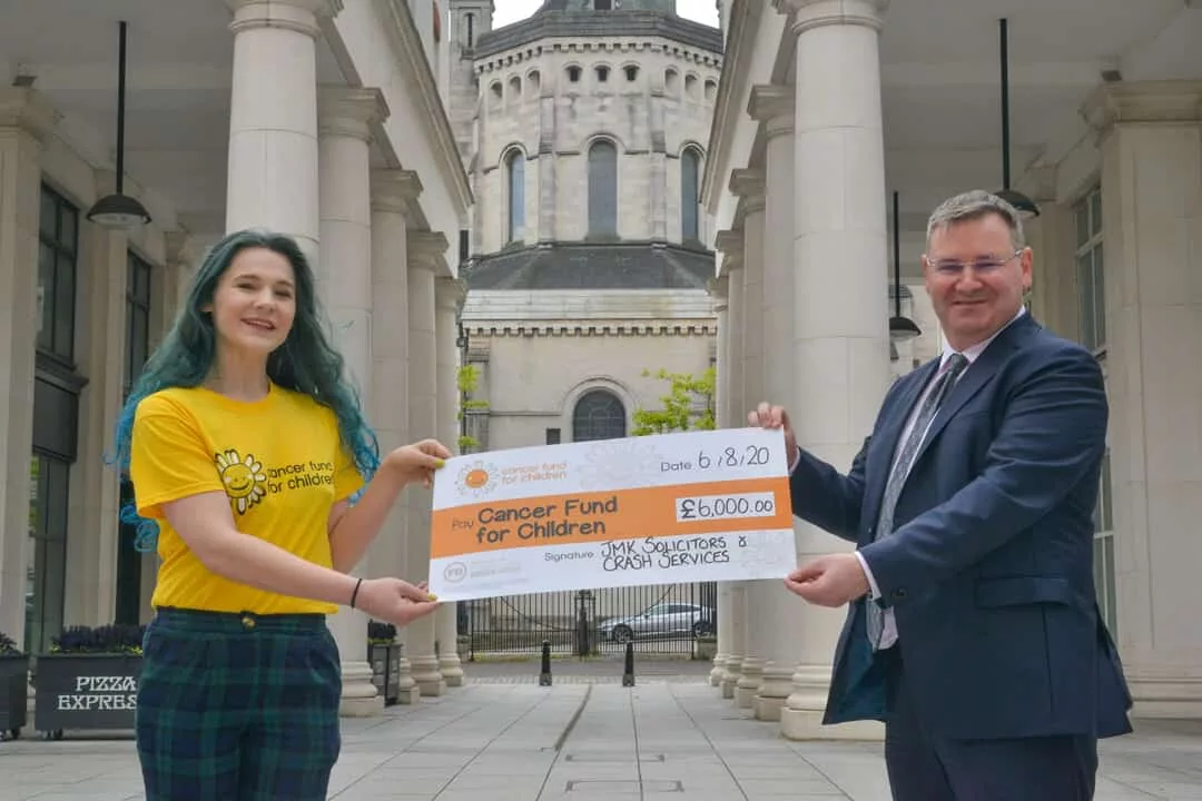 NI: JMK Solicitors and CRASH Services donate £6k to Cancer Fund For Children