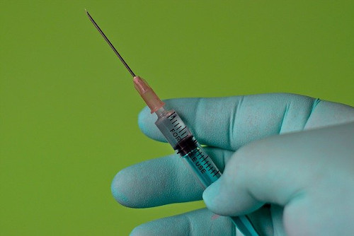 Vaccination compensation scheme being established as a priority