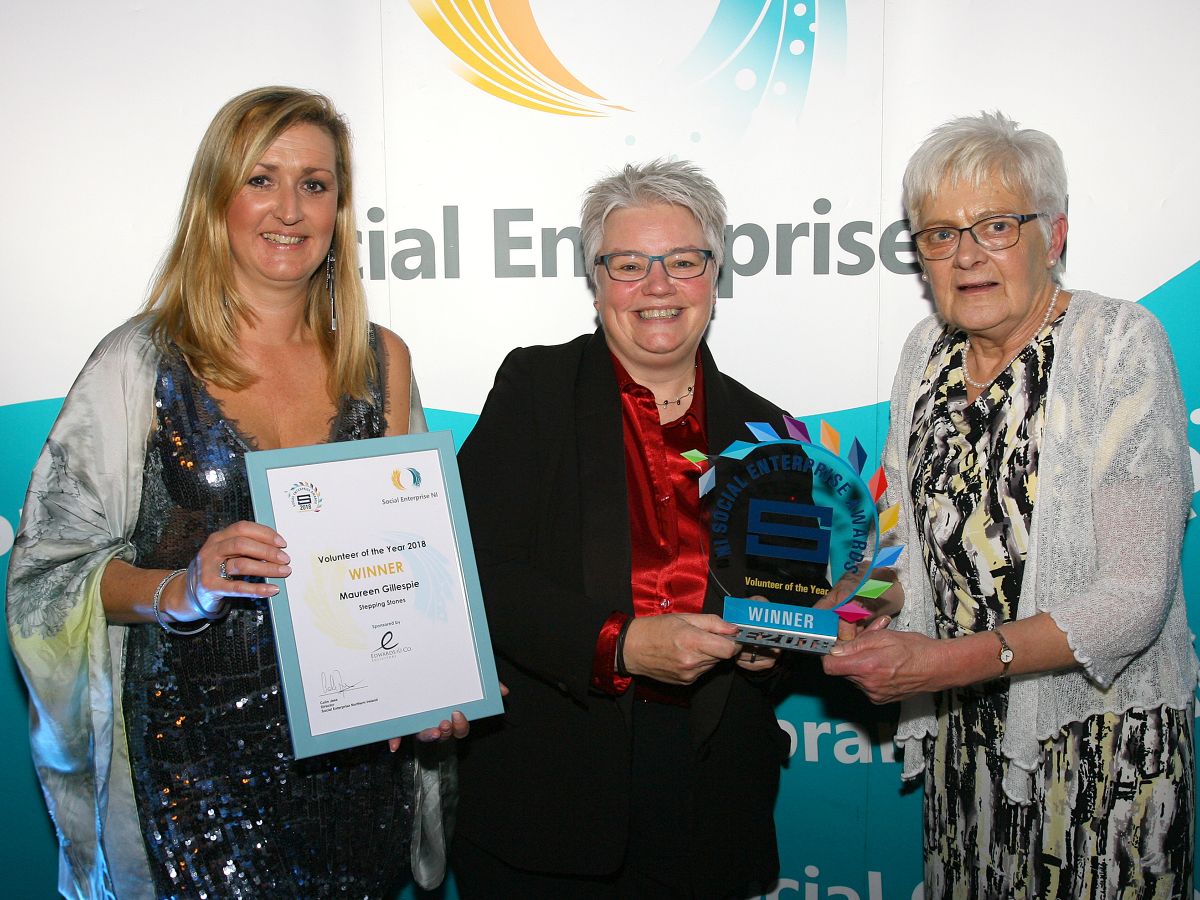 NI: Edwards & Co. Solicitors presents award to autism charity volunteer